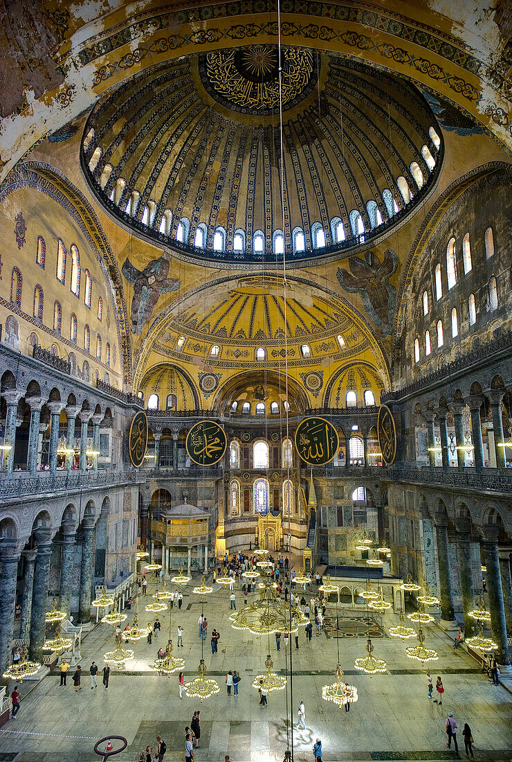 Turkey, Istanbul, Sultanahmet. Interior of Haghia Sophia with domed ceiling and decorative mosaic tiled walls