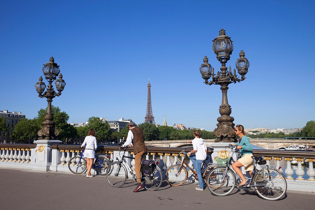 France, Paris, Pont Alexandre III Bridge, Cyclists