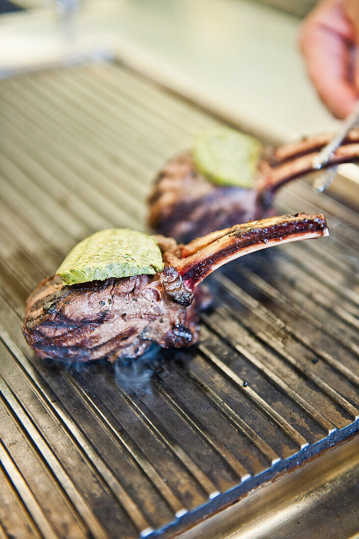 Lamb chops on the grill with herbal butter, Restaurant, Food