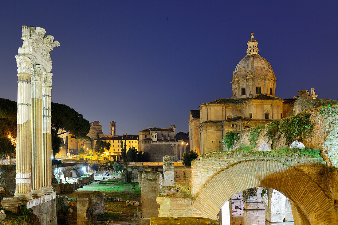 Illuminated Roman Forum with church Santi Luca e Martina in the background, UNESCO World Heritage Site Rome, Rome, Latium, Lazio, Italy