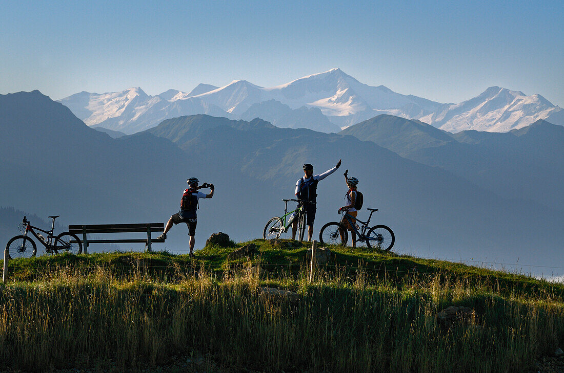 Mountain bikers at Lake Salvensee, Hohe Salve, Kitzbuehel Horn, Kitzbuehel Alps, Tyrol, Austria