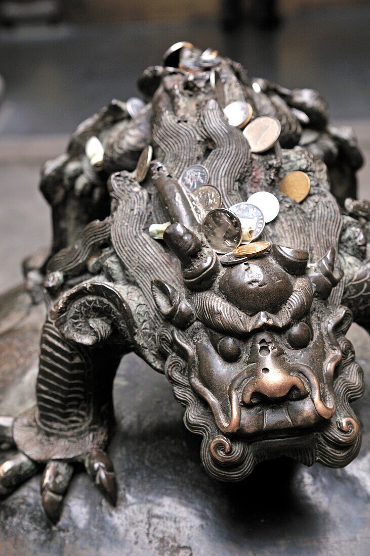 Brass dragon with sacrificed money, Jade Buddha-Temple, Shanghai, China