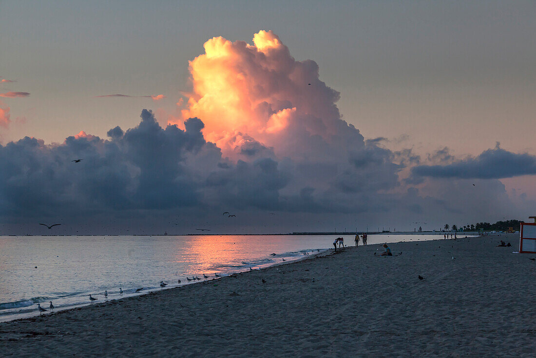 Morning impression on the beach with thunderstorm clouds, South Beach, Miami, Florida, USA