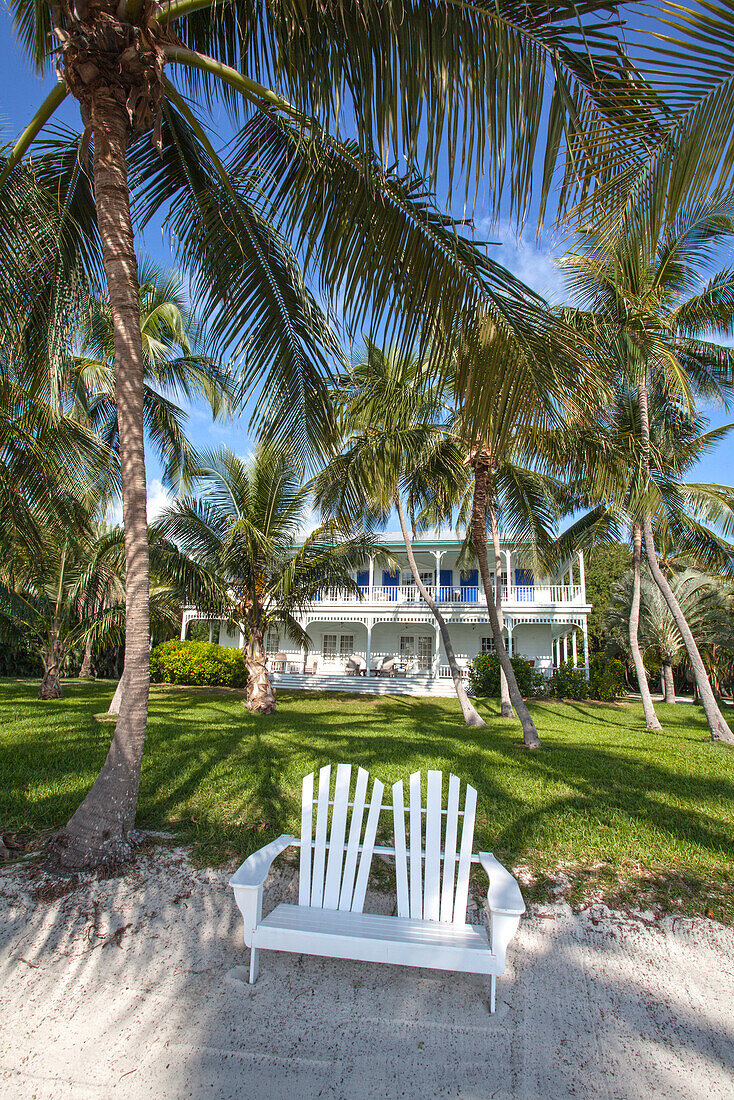 Beach at the Moorings Village Resort with wooden villa BLUE CHARLOTTE in the background, Islamorada, Florida Keys, Florida, USA