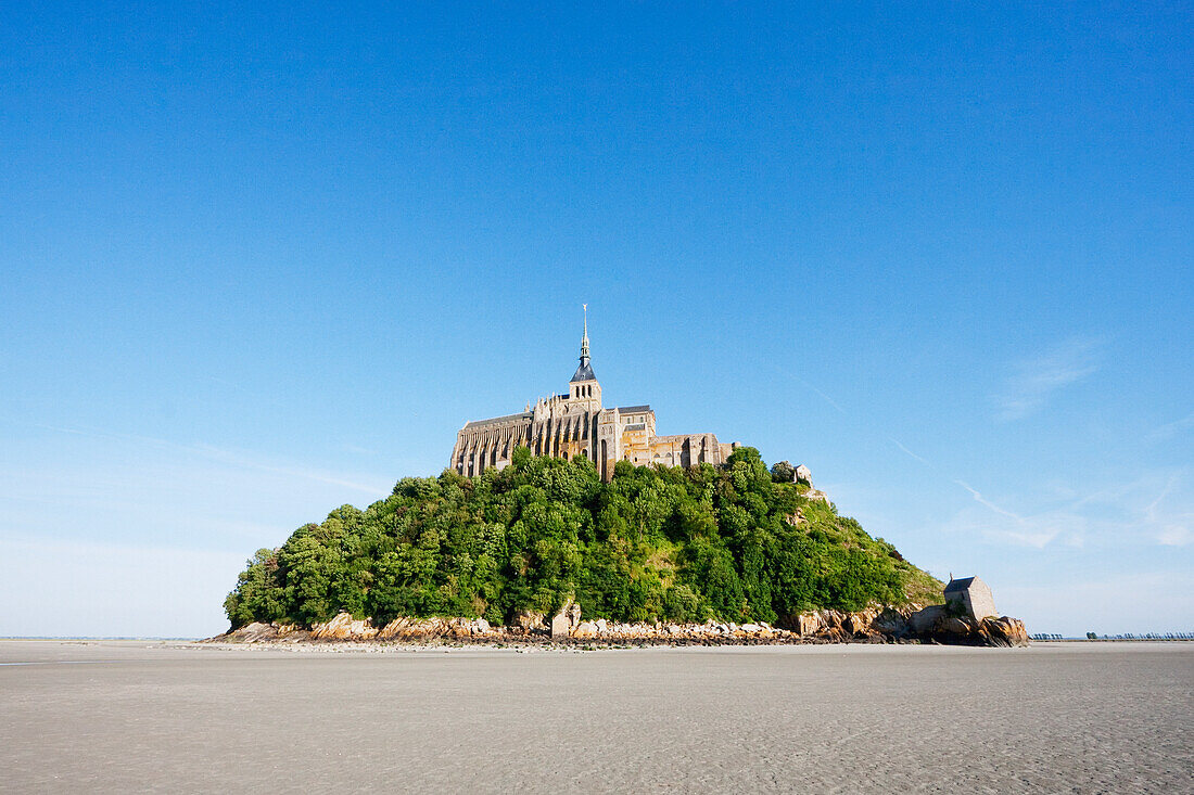 Mont-Saint-Michel and mudflats in the bay, as seen from the West, France