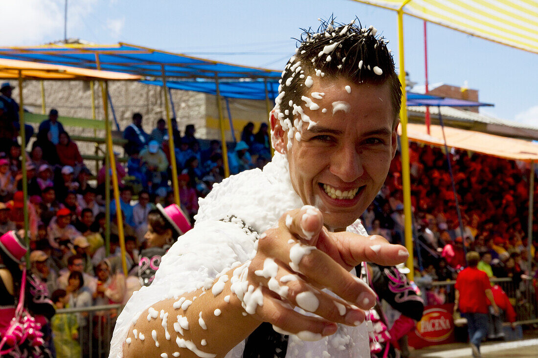 Man covered in foam during Carnaval de Oruro, Oruro, Bolivia