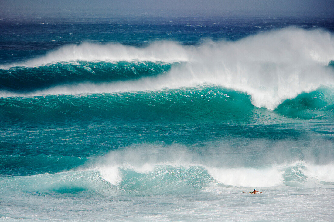 Hawaii, Maui, Surfer at Pavillions, Hookipa Beach Park.