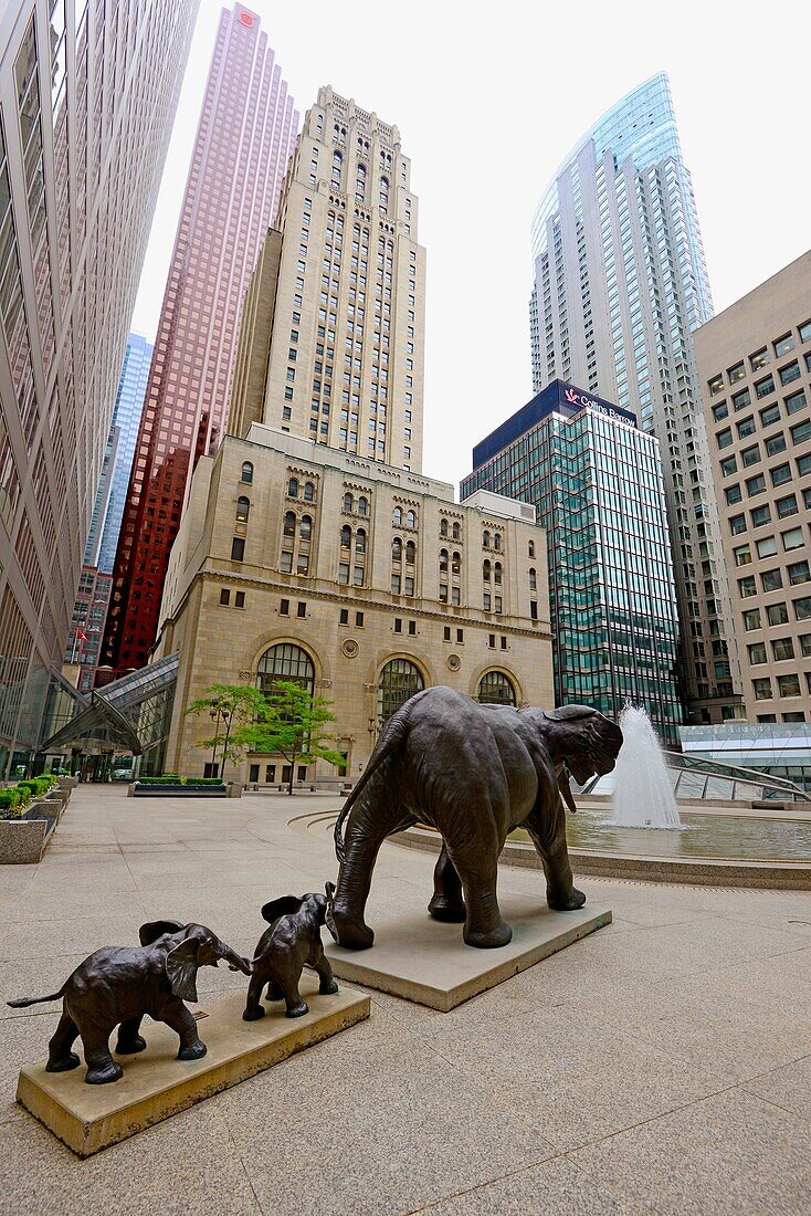 Downtown city life Toronto Ontario Canada Elephant sculptures representing strength and loyalty located inside Toronto financial district commerce court