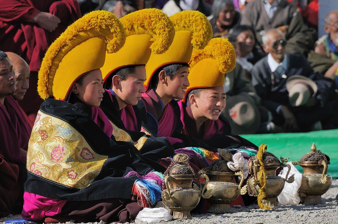 China, Gansu, Amdo, Xiahe, Monastery of Labrang Labuleng Si, Losar New Year festival, Young novices watching the masked dances