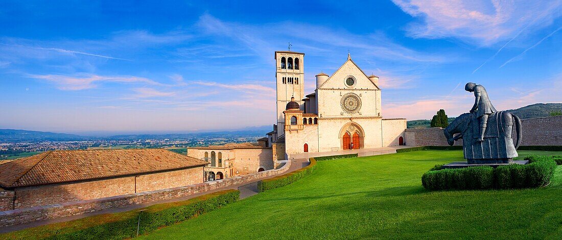 The upper facade of the Papal Basilica of St Francis of Assisi,  Basilica Papale di San Francesco  Assisi, Italy