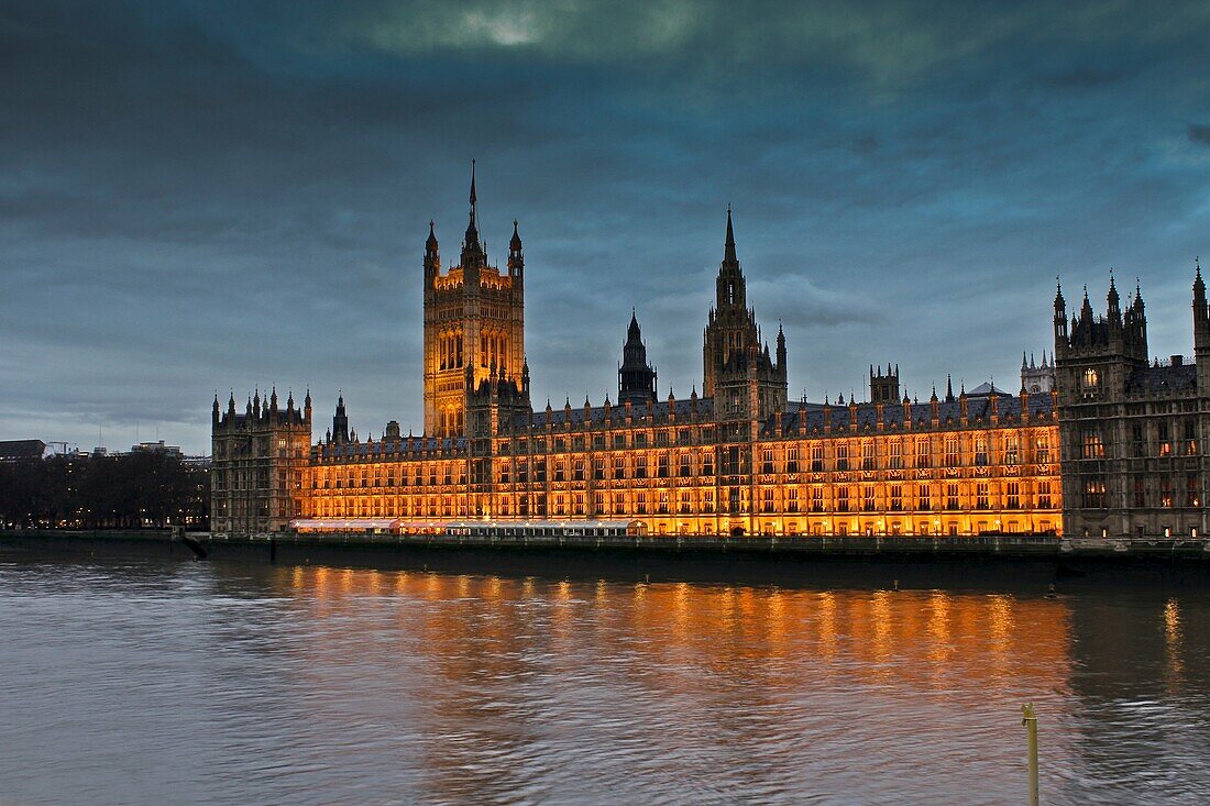 Houses of Parliament, Thames river at evening cloudy , London, England  UK