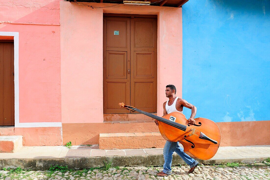 A Cuban musician off to work in Trinidad,Sancti Spiritus Province,Cuba