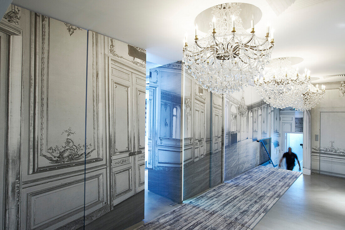 Hallway with chandelier at Hotel La Maison Champs-Elysees, designed by Martin Margiela, Paris, France