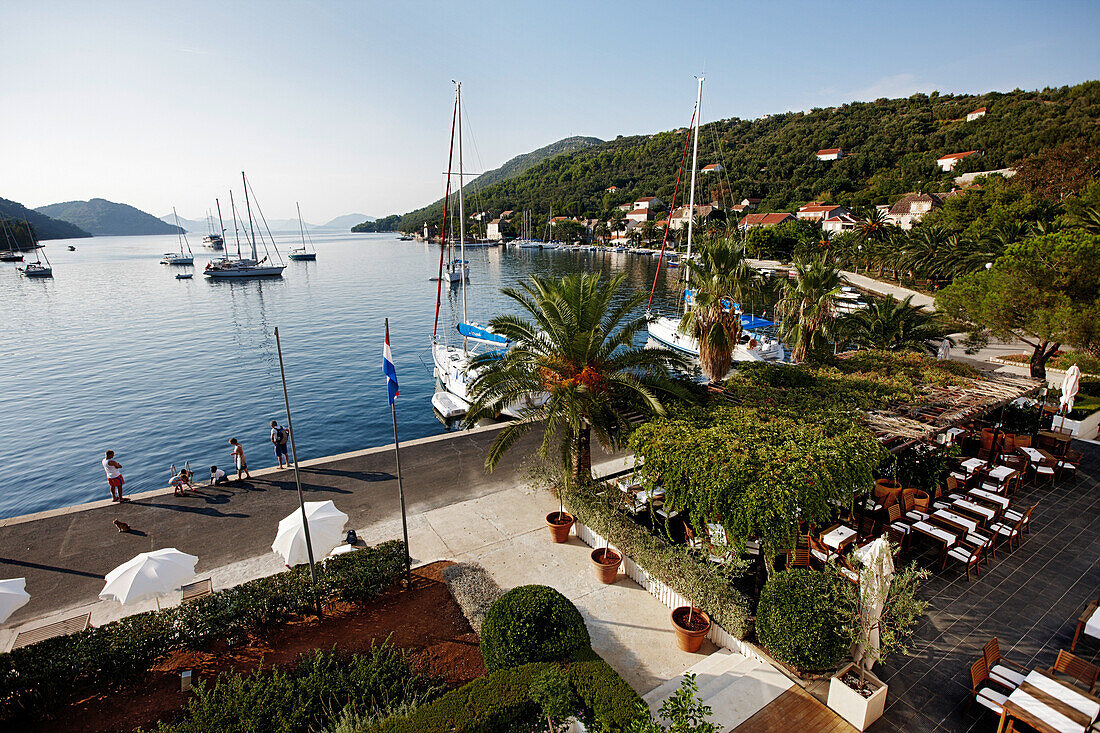 Terrace of hotel restaurant at the natural harbour, Hotel Sipan, Sipanska Luka, Sipan island, Elaphiti Islands, northwest of Dubrovnik, Croatia