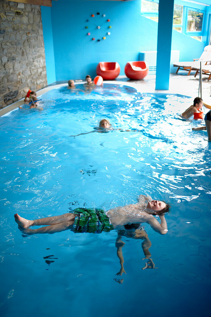 Children in the pool at Hotel Haus Hirt, Bad Gastein, St. Johann im Pongau, Salzburg, Austria