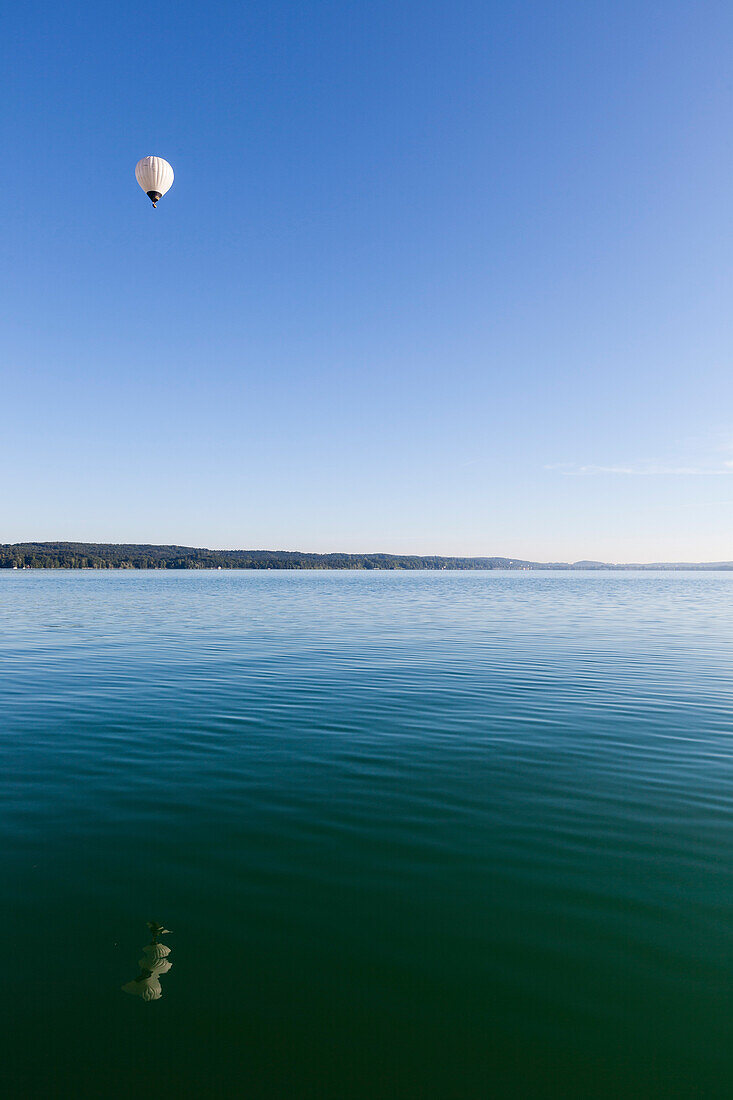 Hot-air balloon above Lake Starnberg, Poecking, Bavaria, Germany