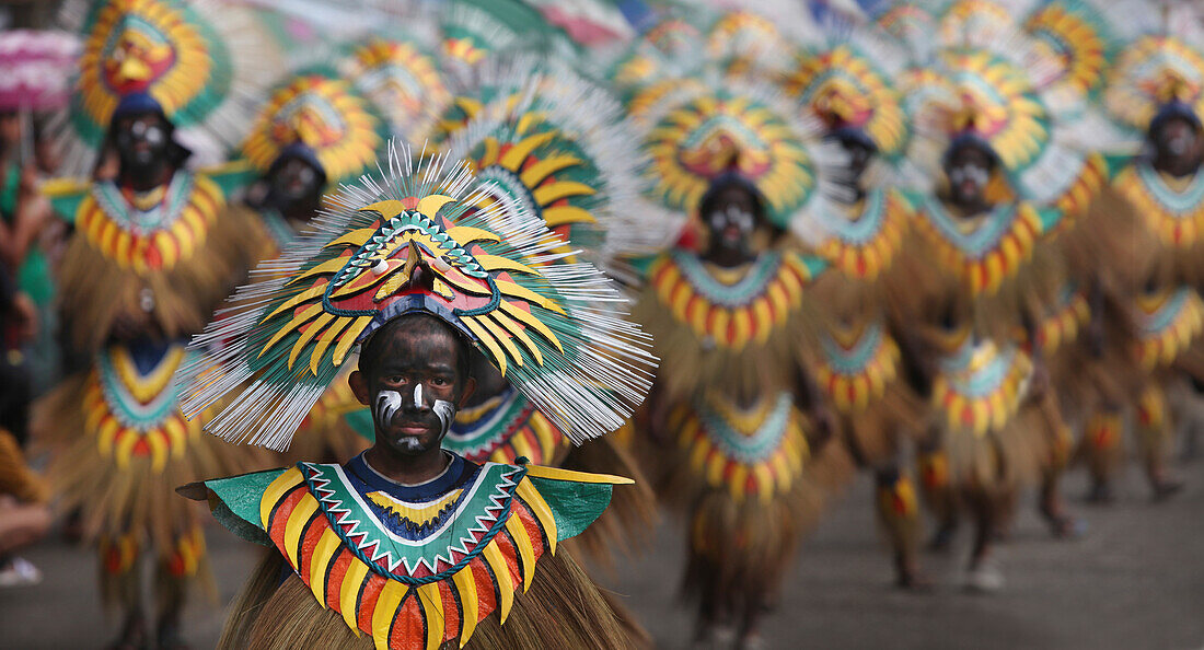 Boy at the Ati Atihan Festival wearing clothes, Kalibo Aklan Panay Island, Philippines