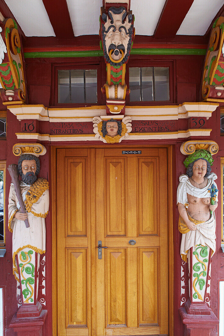 Portal with carvings in style of Hadamarer Barock, Detail of the historic Town hall from 1639, Half-timbered house, Hadamar, Westerwald, Hesse, Germany, Europe