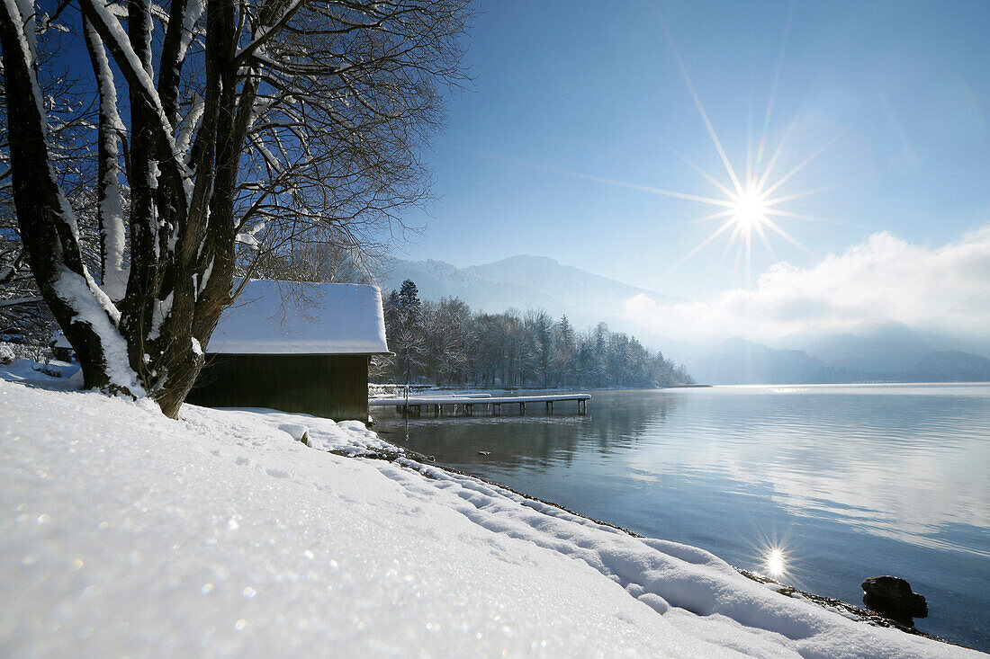Snow-covered scenery at lake Kochel, Kochel, Upper Bavaria, Germany