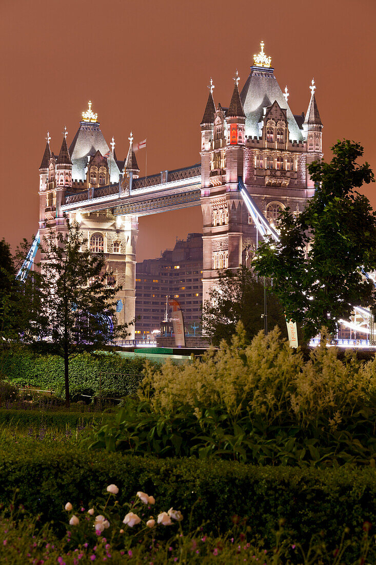 Tower Bridge with lights at night, London, England