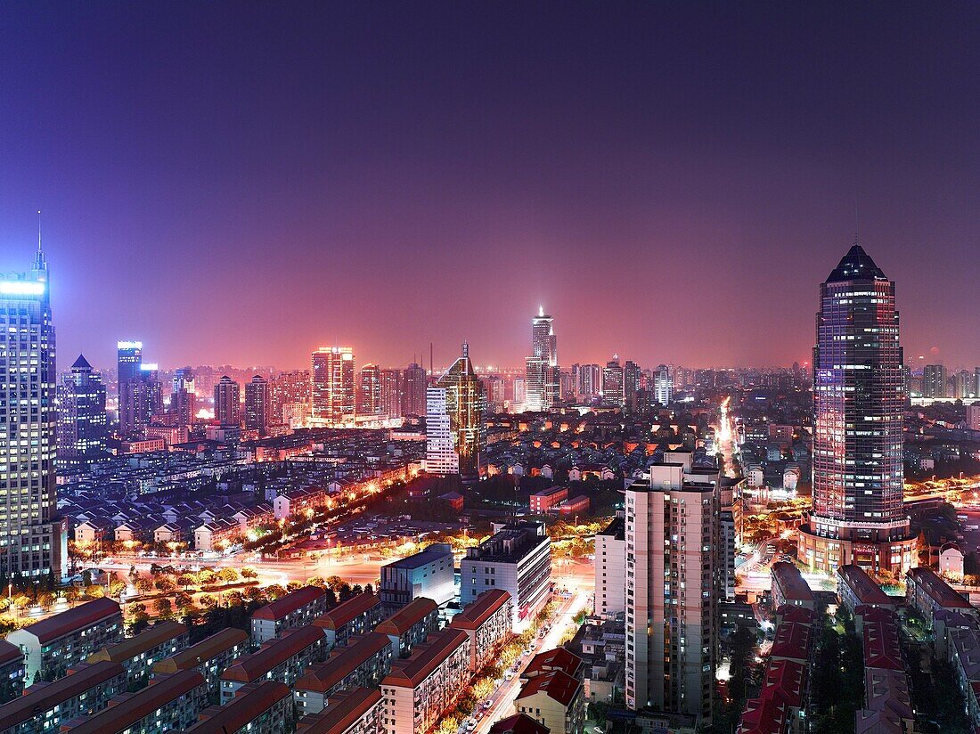 Night view of city landscape and residential complexes in Pudong, Shanghai, China