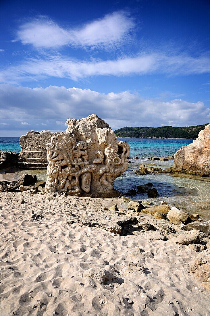 Carved stone in Las Salinas beach  Ibiza, Balearic Islands, Spain