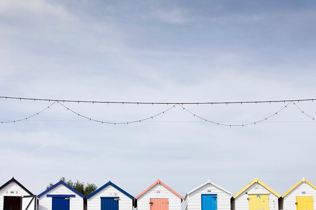 Line of small wood houses in the seafront of Torquay, England
