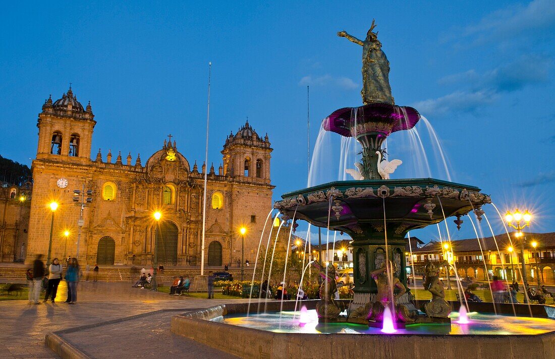 Beautiful colorful night exposure of fountain Main Square in center of Cusco Cuzco Peru in South America