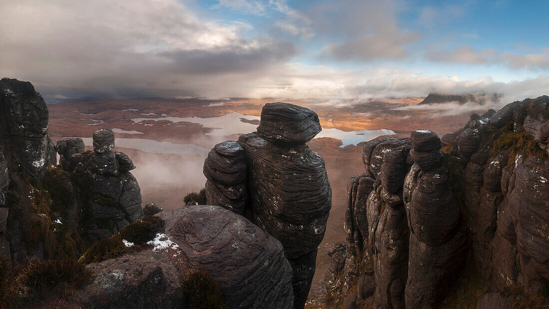 View from Stac Pollaidh over the Inverpolly Nature Reserve with typical sandstone formations in the foreground, Sutherland, Scotland, United Kingdom