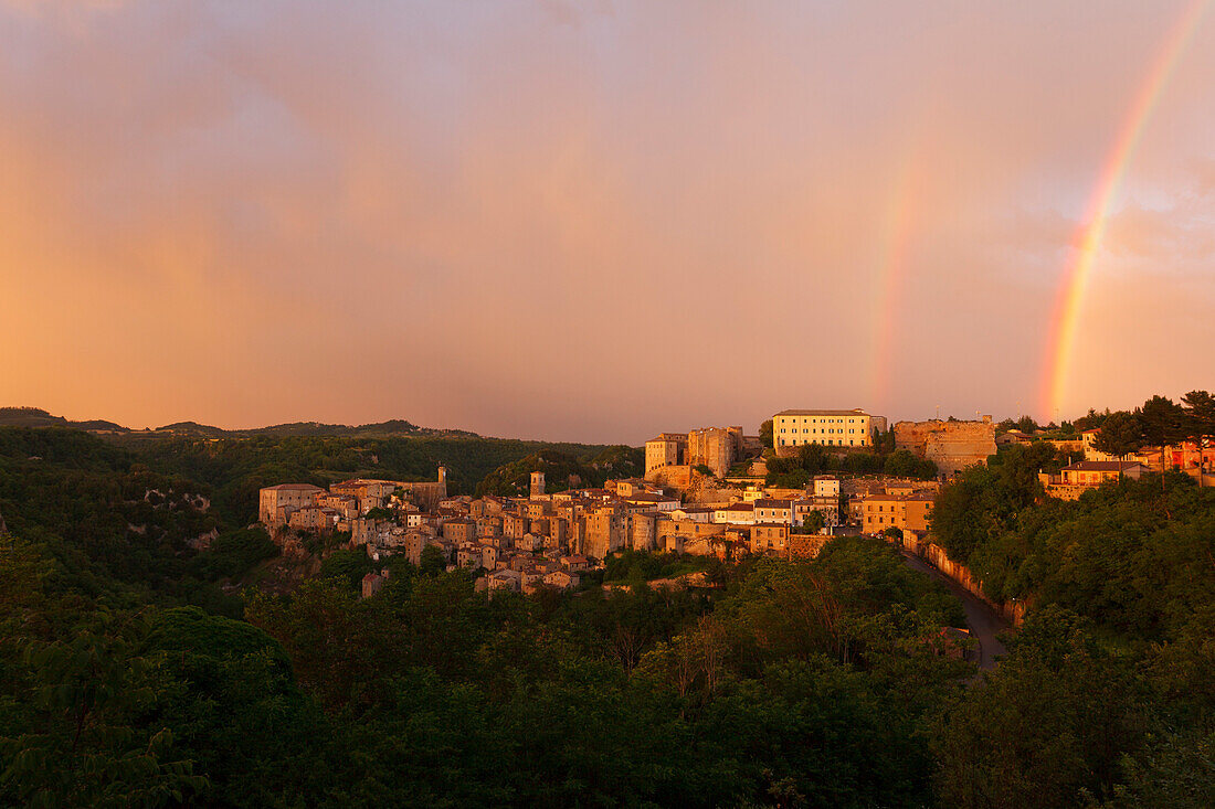 Sorano with rainbow above Orsini castle, hill town, province of Grosseto, Tuscany, Italy, Europe