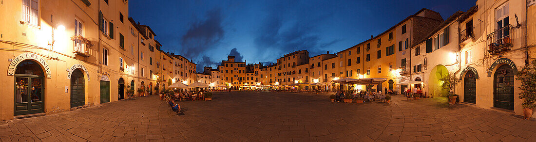 Piazza dell Anfiteatro square with restaurants in the historic centre of Lucca, UNESCO World Heritage Site, Tuscany, Italy, Europe