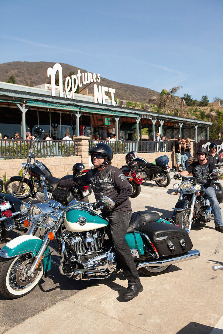 USA, California, Malibu, bikers in front of Neptunes Net Restaurant on the Pacific Coast Highway