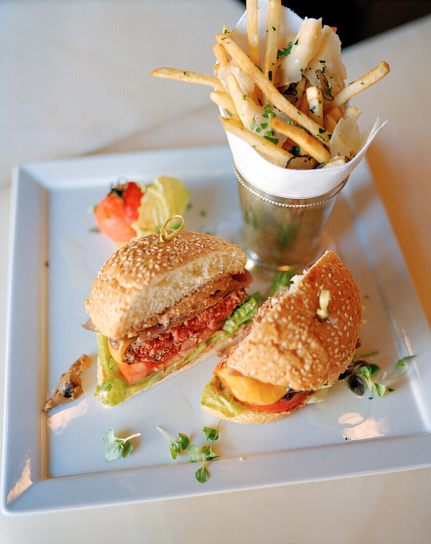 USA, California, Los Angeles, Beverly Hills, food shot of a hamburger and fries at The BLVD Restaurant, Beverly Wilshire Hotel, Four Seasons Resort on Rodeo Drive