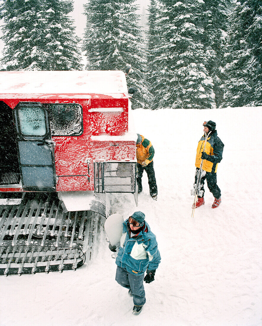 CANADA, people standing outside of snow cat, Island Lake lodge, elevated view