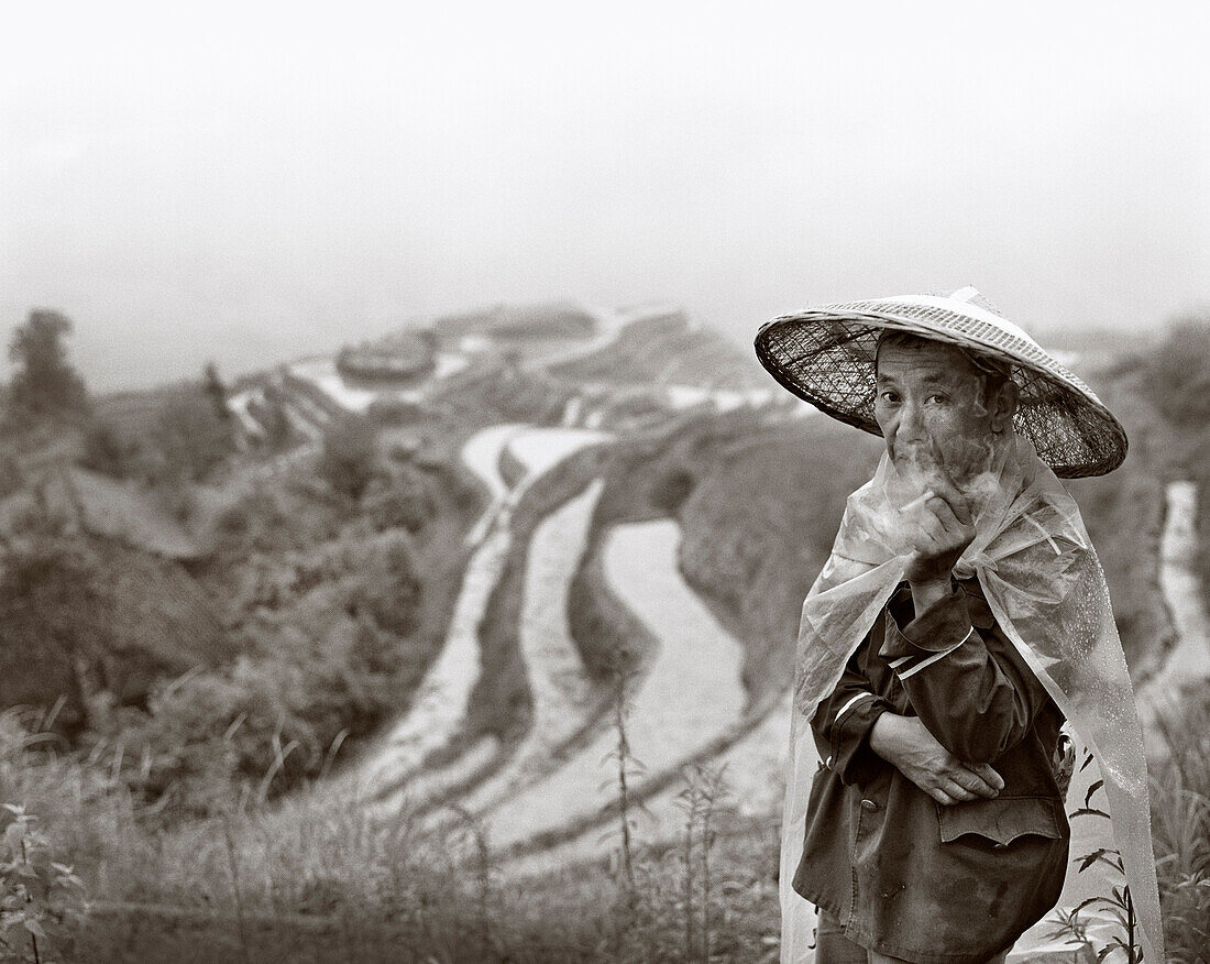 CHINA, portrait of Chinese rice farmer, Dragon Backbone Rice Terraces (B&W)