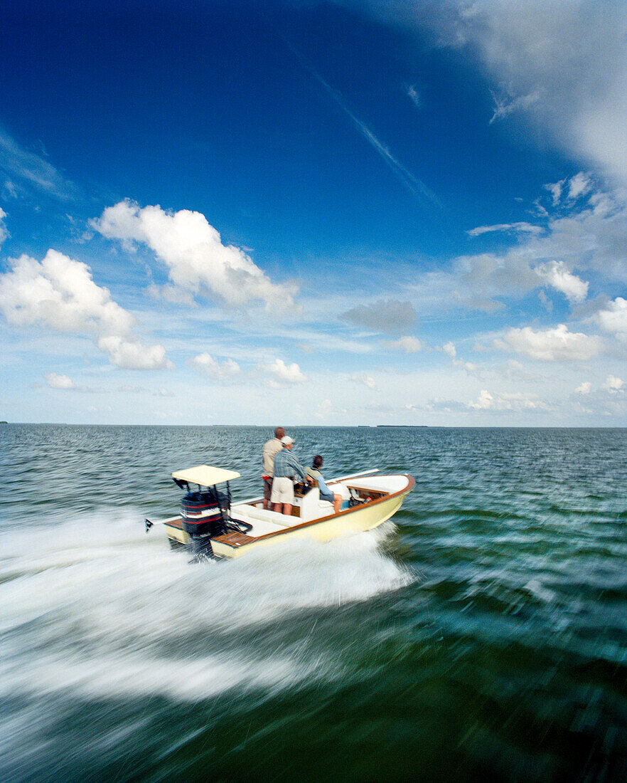 USA, Florida, men in a boat going fishing, Ivory Keys