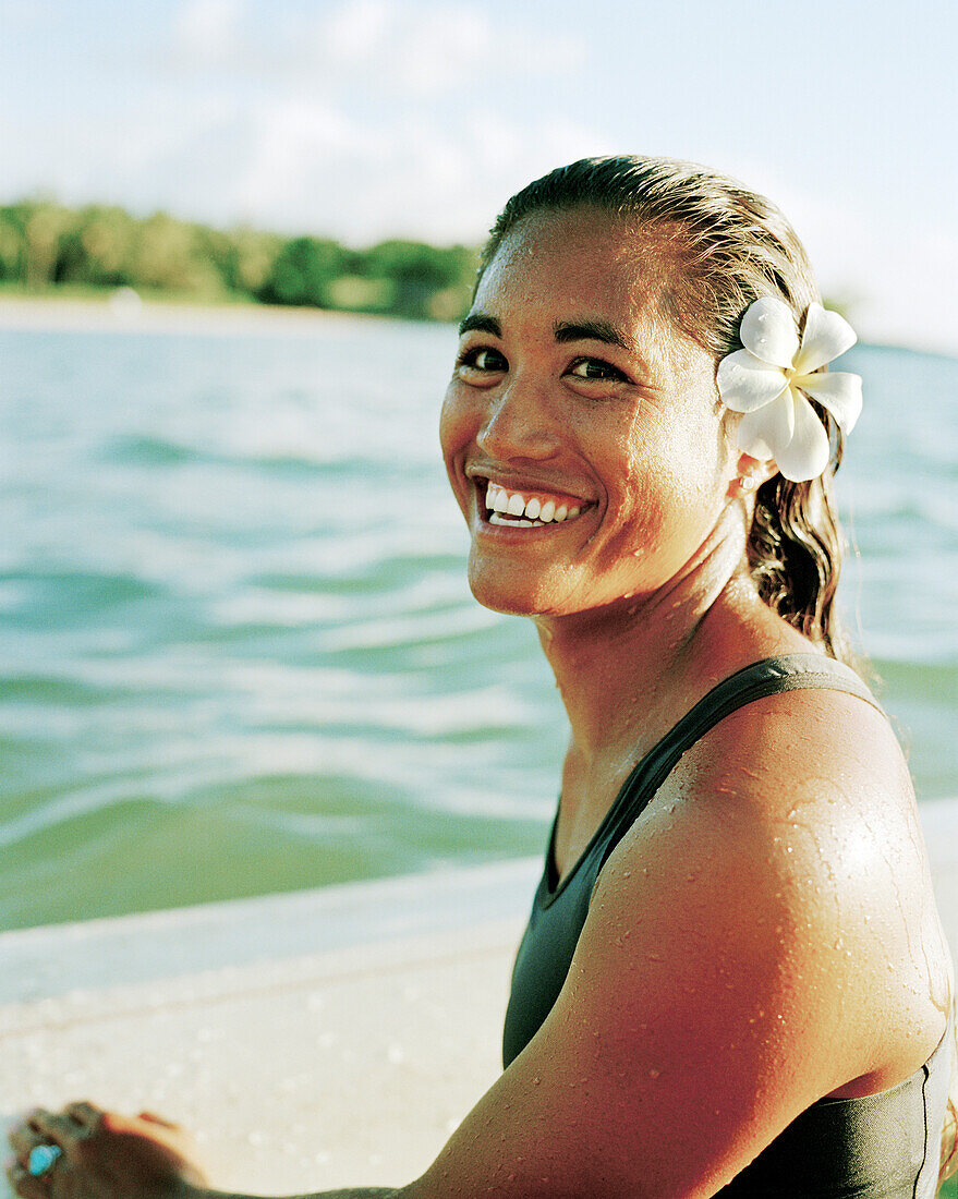 USA, Hawaii, a beautiful female lifeguard smiling, The Big Island
