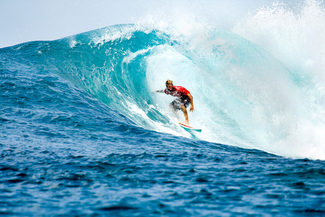 INDONESIA, Mentawai Islands, Kandui Resort, young man surfing in the barrel, Bankvaults