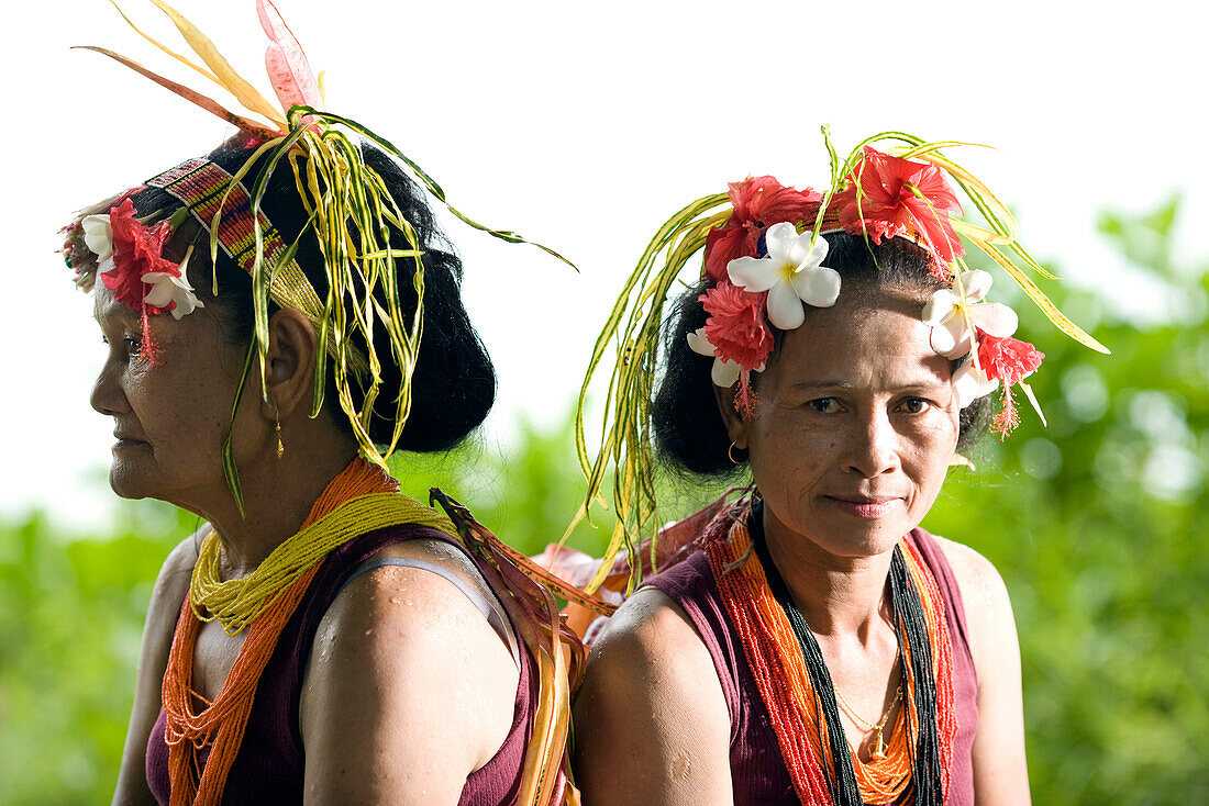 INDONESIA, Mentawai Islands, Kandui Resort, portrait of mature Mentawai women in traditional clothing