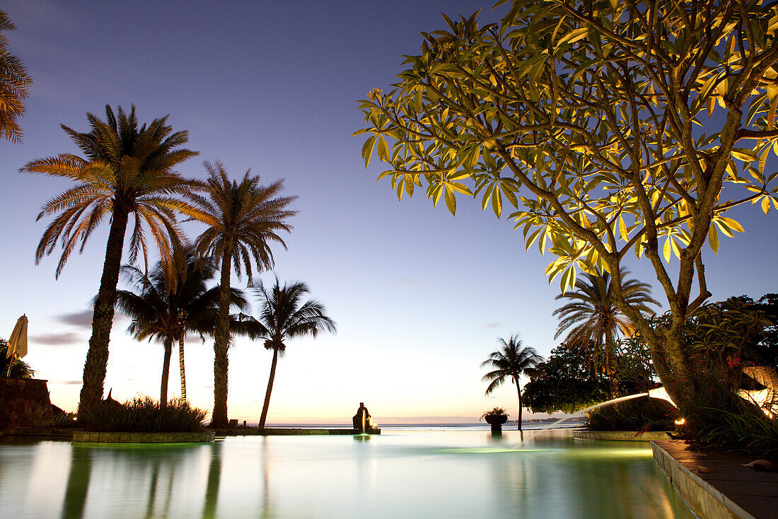 MAURITIUS, Chemin Grenier, South Coast, the pool at Hotel Shanti Maurice at dusk