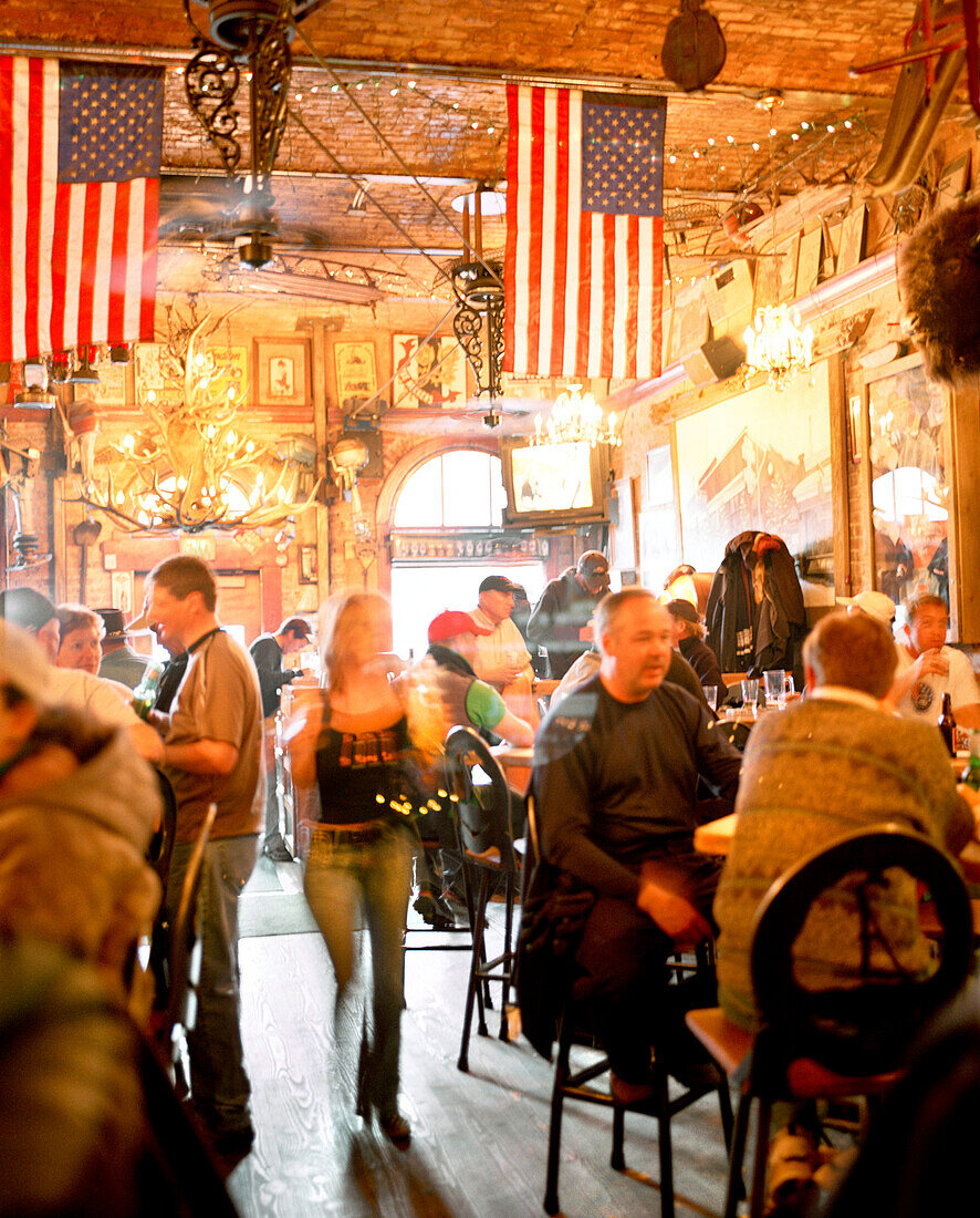 USA, Utah, people socializing at the No Name Bar, Park City