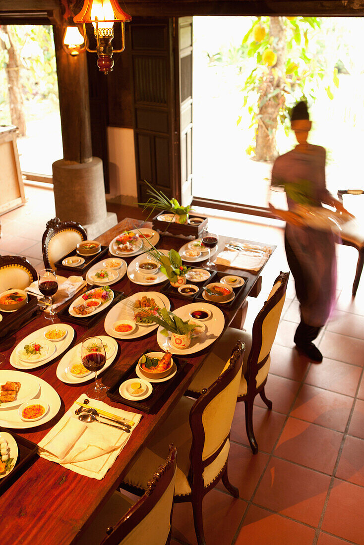 VIETNAM, Hue, a table is set for an early dinner at Ms. Boi Trans home in Hue