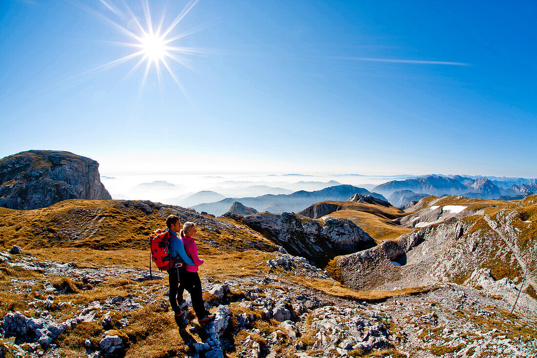 Hikers looking at view, Hochschwab mountain range, Styria, Austria