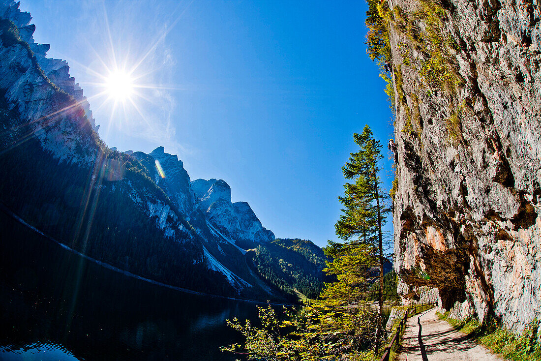 Climber at rock face, Gosauseen, Salzkammergut, Upper Austria, Austria