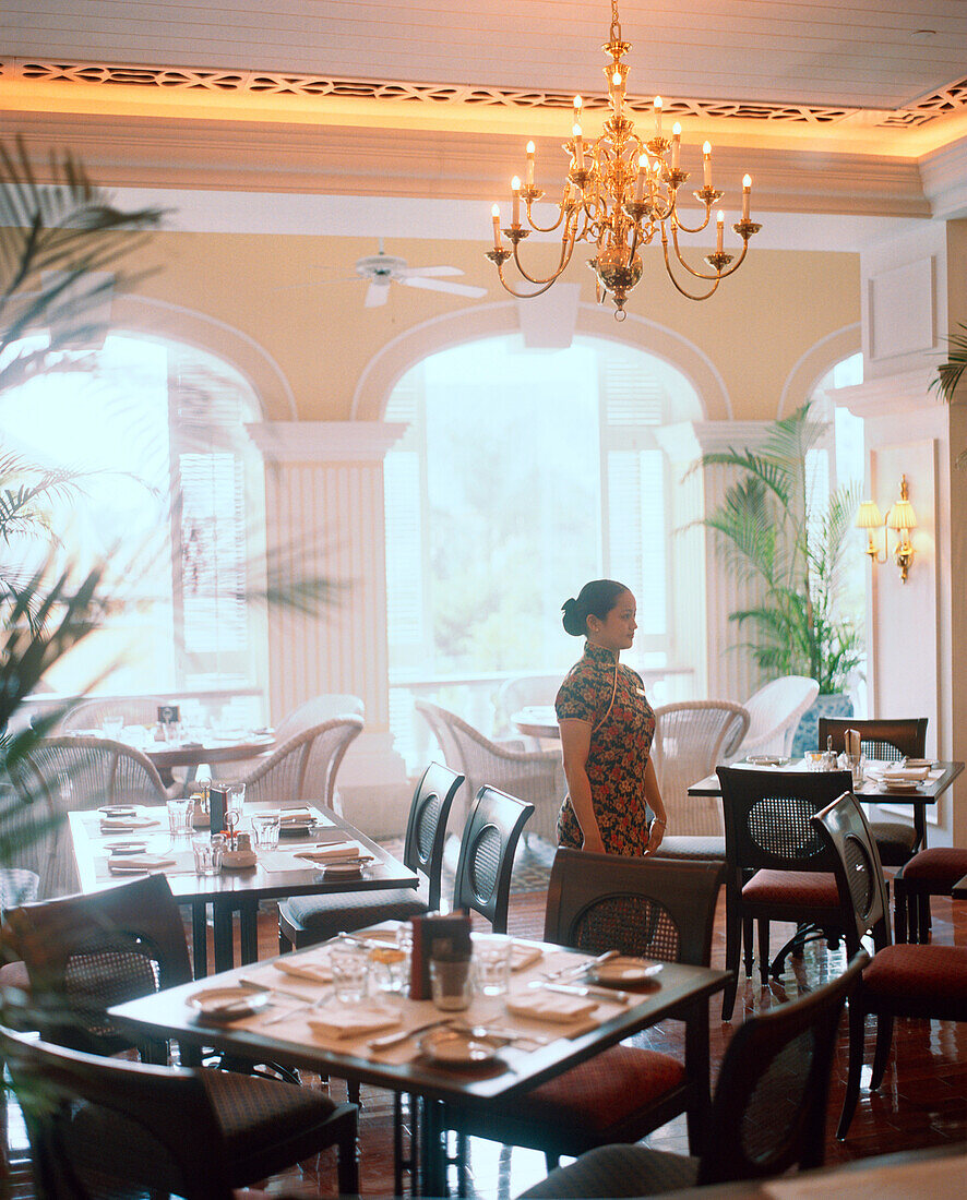 CHINA, Macau, Macau, waitress standing in Bella Vista Cafe