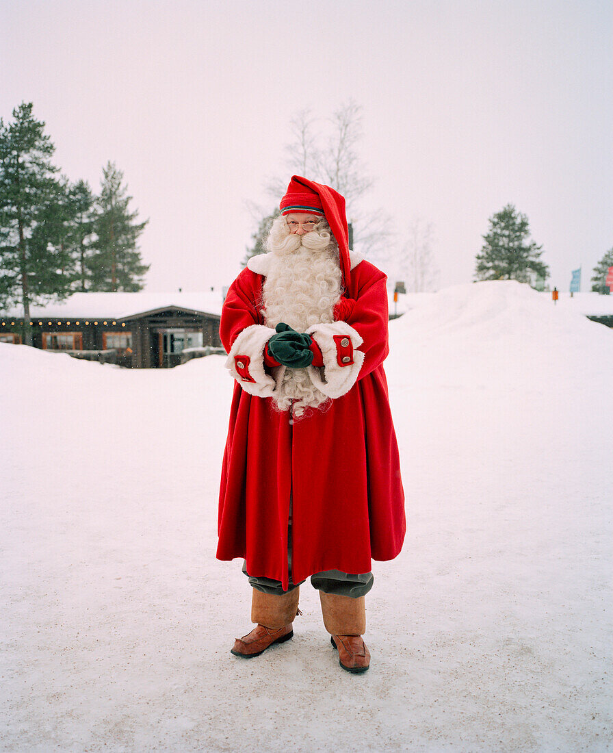 FINLAND, Rovaniemi, portrait of Santa Claus in the Santa Clause Village.