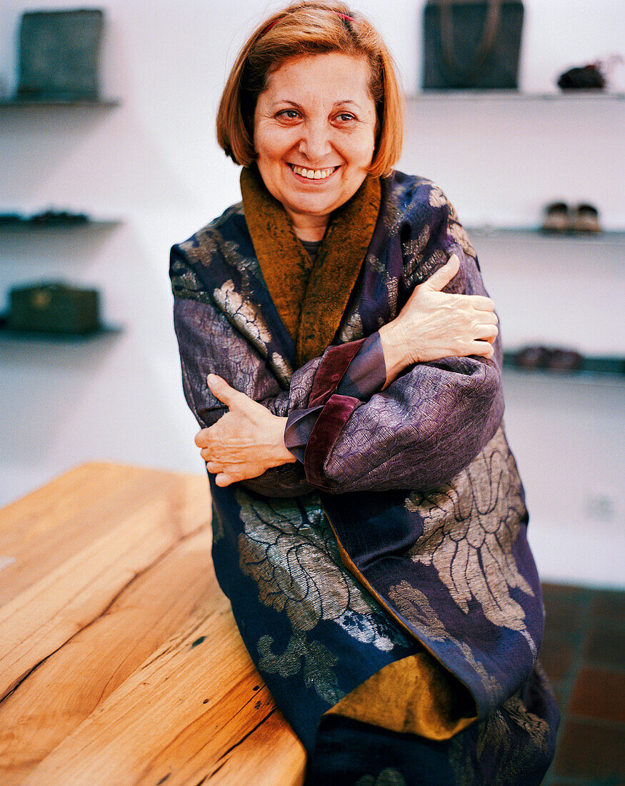 TURKEY, Istanbul, portrait of a happy fashion designer