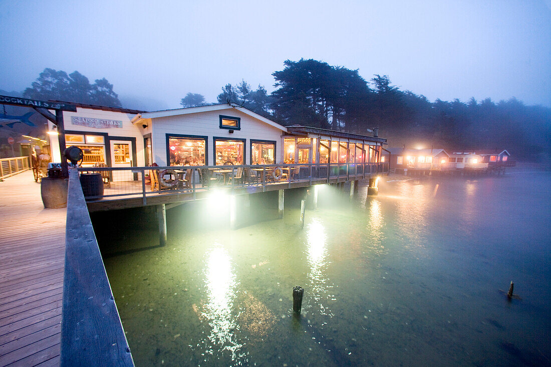 USA, California, Nick' Cove Restaurant at night, Tomales Bay