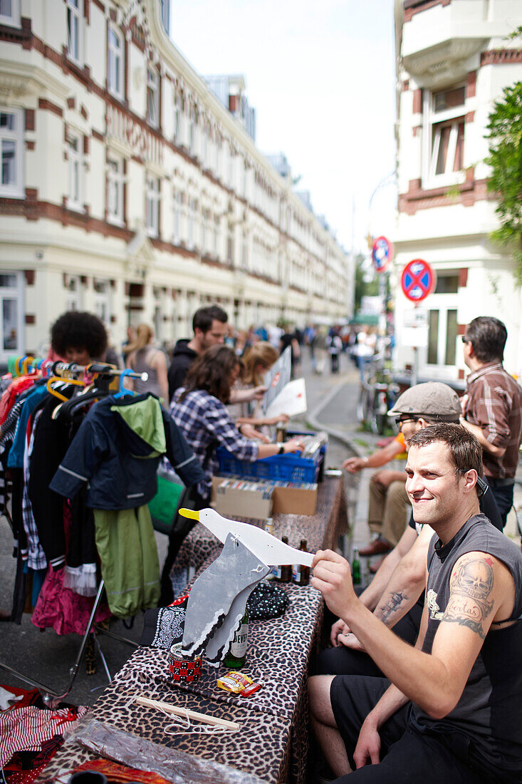 Stephan selling his stuff at the fleamarket in Beckstrasse, Schanzenviertel, Hamburg, Germany