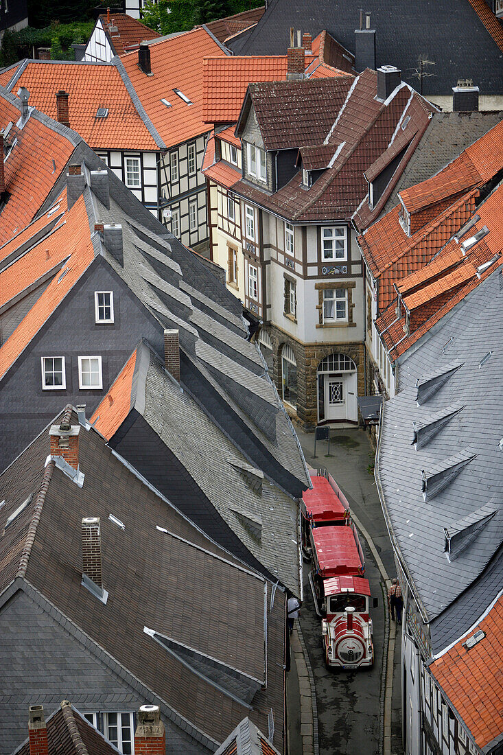 Tourist train in an alley in the historic old town of Goslar, Lower Saxony, Germany